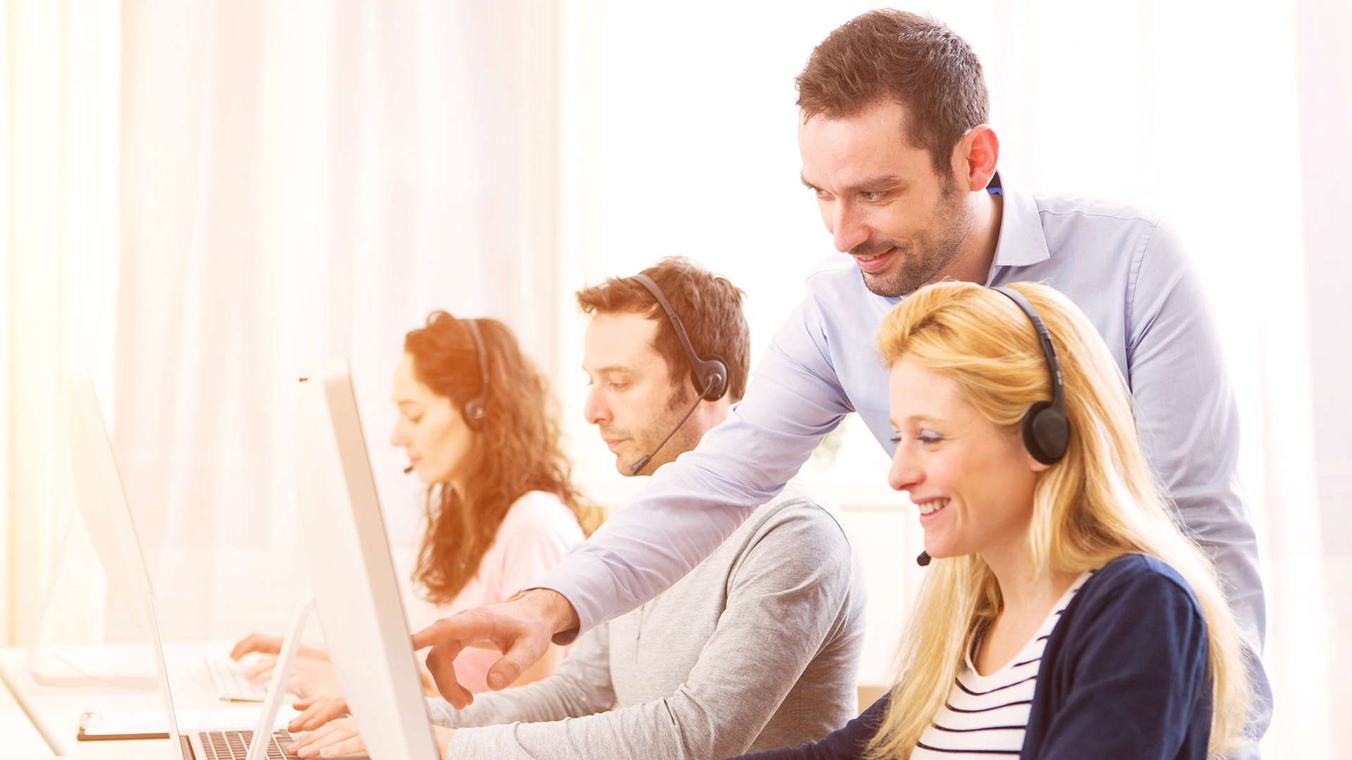 Call Center Agents happily working together