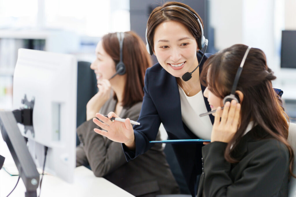 a group of women wearing headsets