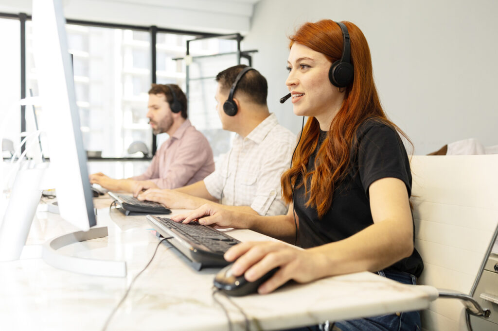 Cxperts Business Process Outsourcing (BPO) professionals working in a modern office environment, collaborating on customer experience solutions